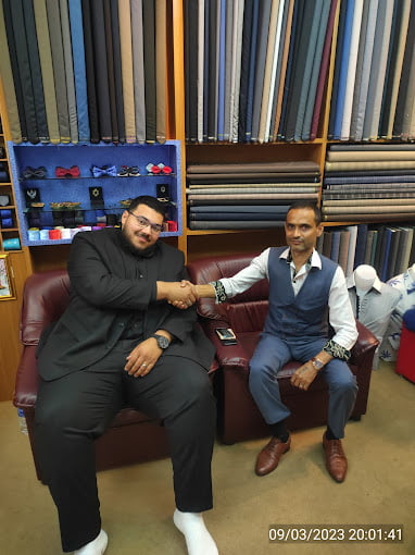 a man buying Budget-Friendly Custom Suits from Lucky 