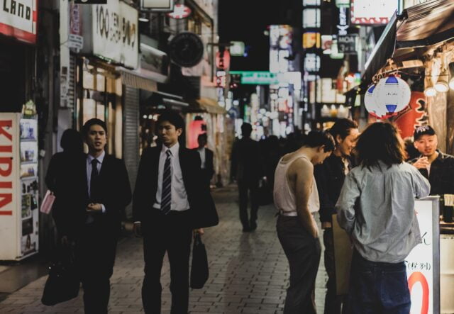 people on street during night