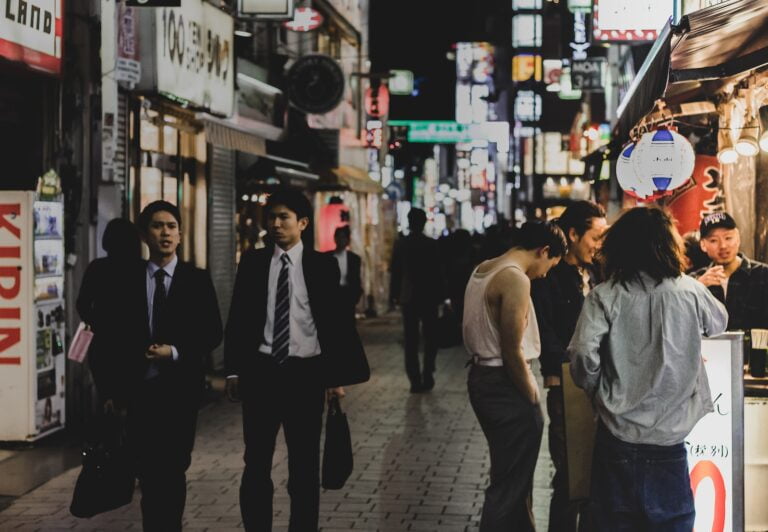 people on street during night