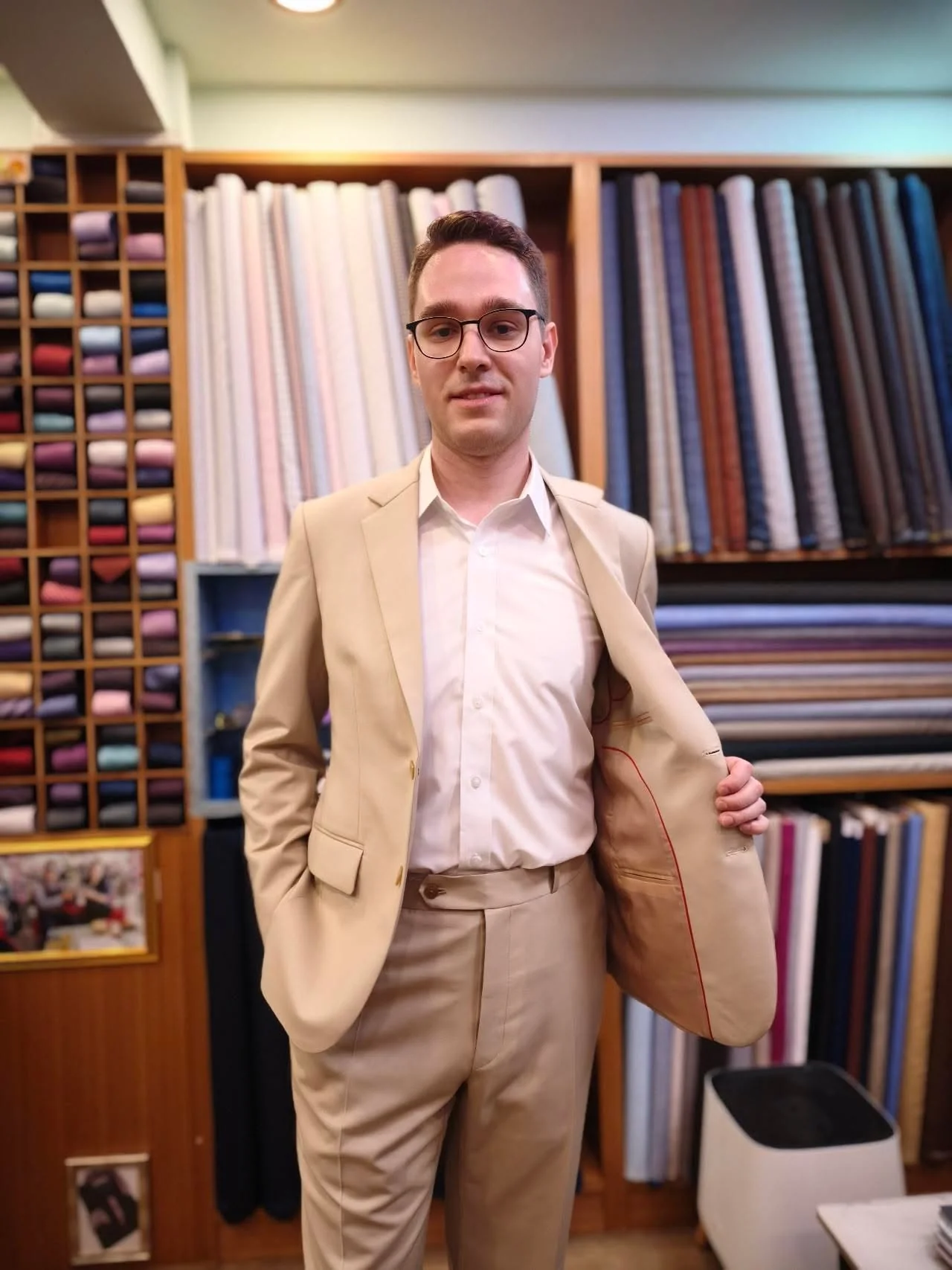 Lightweight beige custom suit suitable for Chiang Mai heat and travel